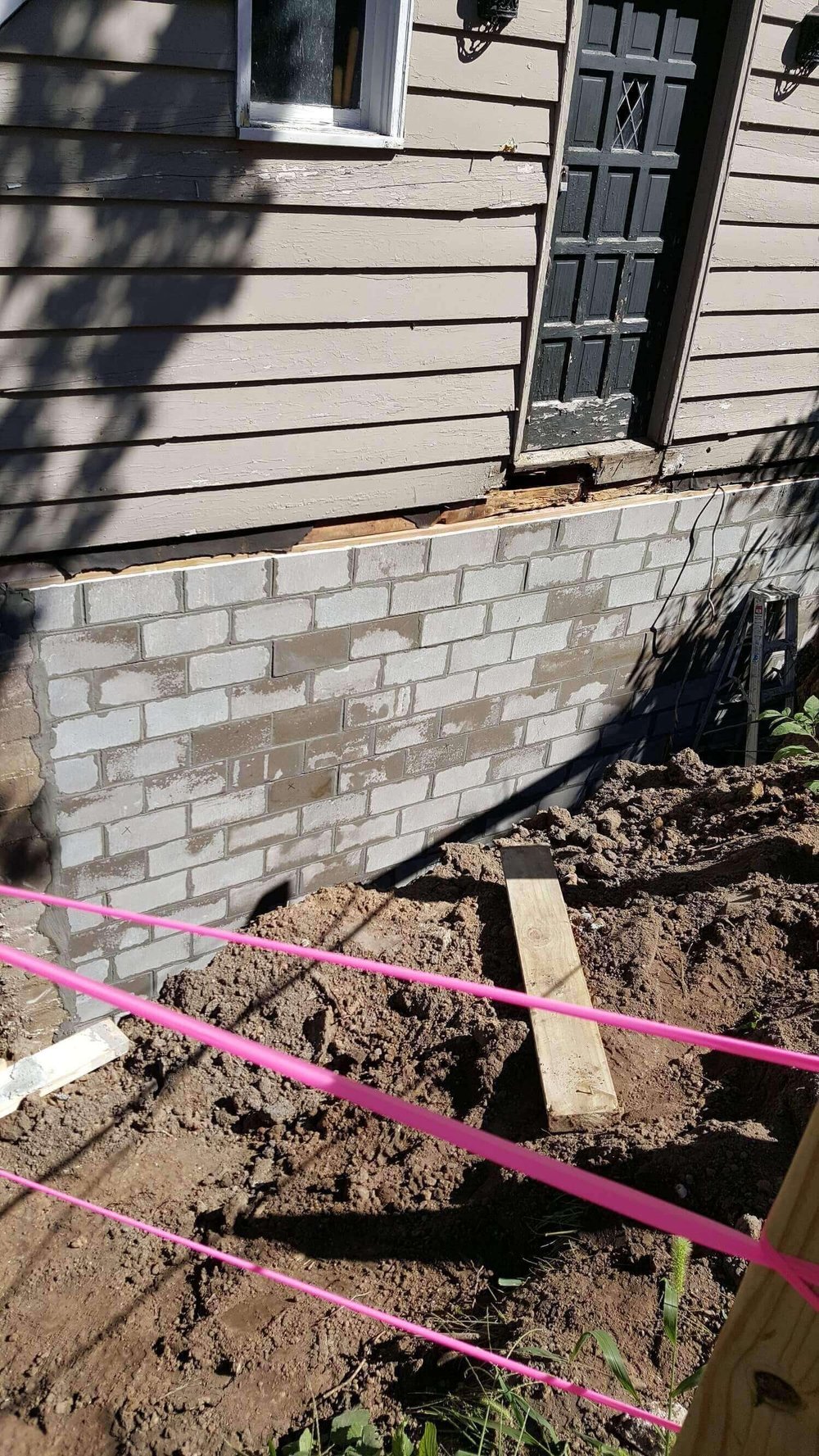 Foundation wall before and after crack repair